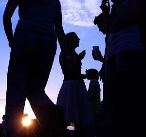 Silhouettes people in festival