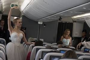 katherine-jenkins-and-dancers-from-the-bolshoi-ballet-perform-at-40000-feet-onboard-british-airways-inaugural-787-9-flight-between-london-and-moscow_8