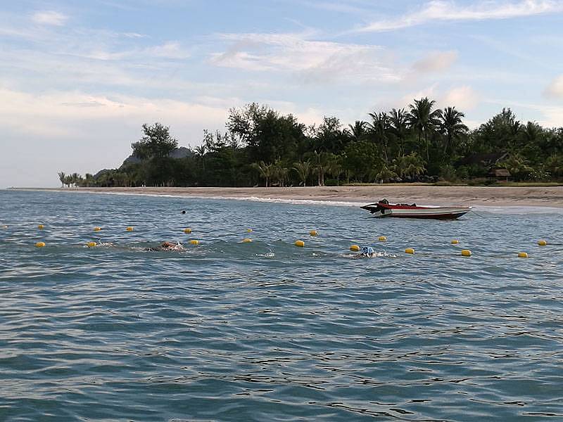 Participants swimming to the finishing line