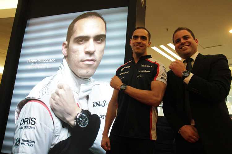 Williams F1 Racer, Pastor Maldonado and Oris' Karim Gerber posing with the Oris Artix GT Chronograph