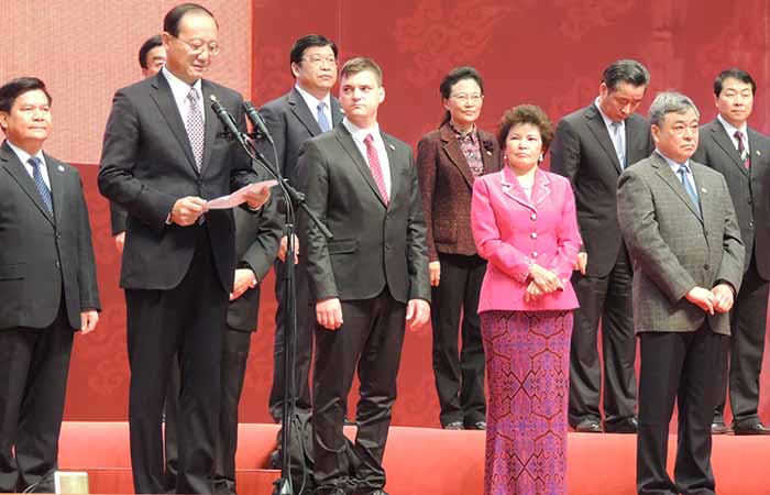 Chairman of Tourism Malaysia, Dato’ Sri Dr. Ng Yen Yen (in red) at the opening ceremony of China International Travel Mart 2013 officiated by Mr. Shao Qi Wei, Director of China National Tourism Administration (at microphone).