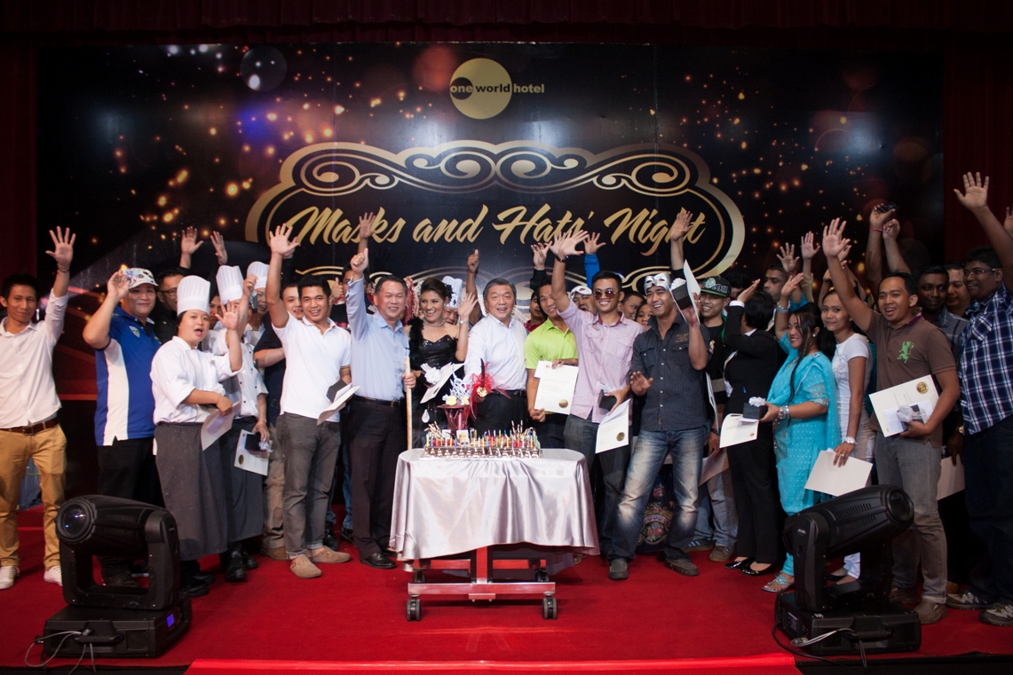 One World Hotel top management celebrating with the recipients of the Long Service Awards, the staff who has been serving the hotel for at least five years