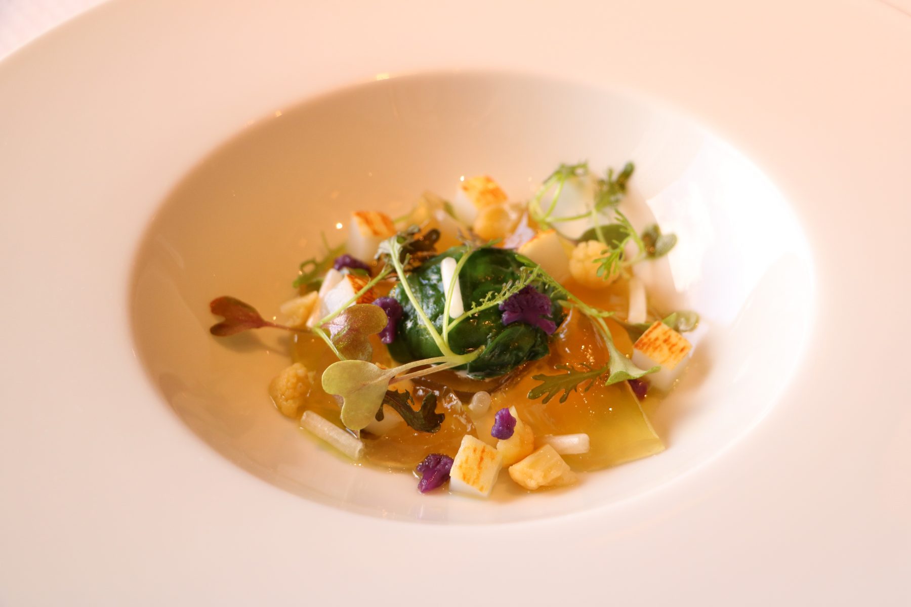 Experience a modern twist of many traditional delicacies whist keeping their authentic tastes and history. (Left: Laksa; right: Gelified Water of Smoked Sunchoke (Pierre))