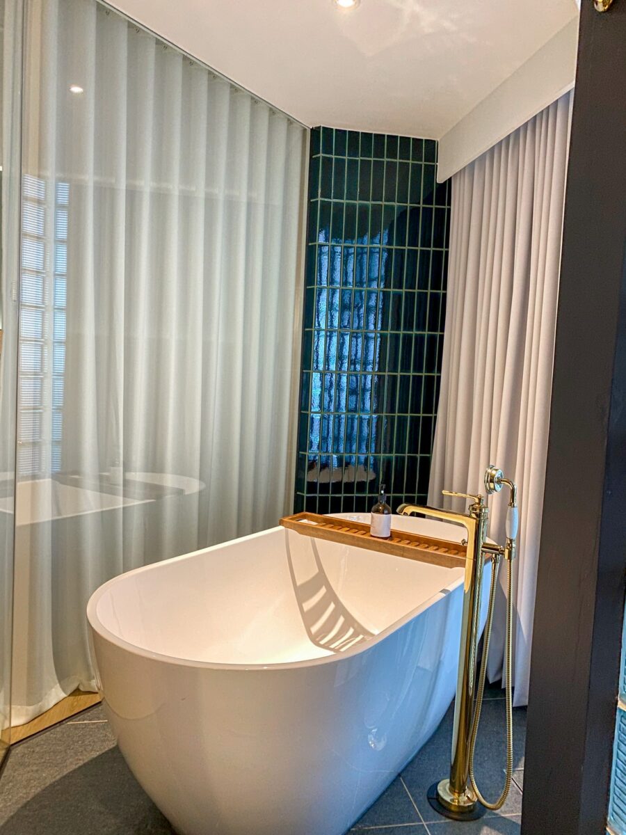 The Palm Marvellous Suite at The Luma comes with an opulent bath tub.