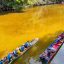 Longboat on the Melinau River surrounded by dense rainforest near Clearwater Cave in Mulu National Park, Sarawak.