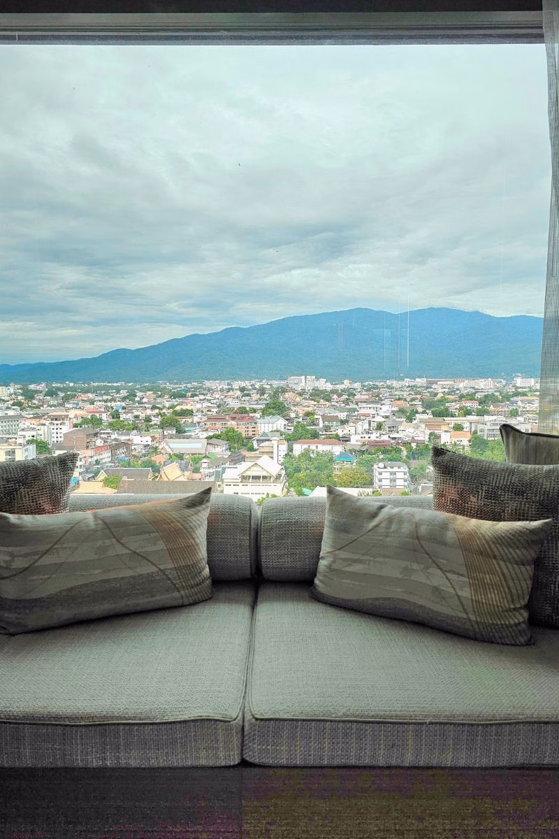 The view of Doi Suthep in the distance and Chiang Mai skyline from the Premium King Mountain View Room. Photo by Juhan bin Kamaruddin.
