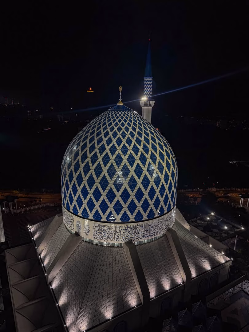 Masjid Sultan Salahuddin Abdul Aziz Shah illuminated at night in Shah Alam, Selangor
