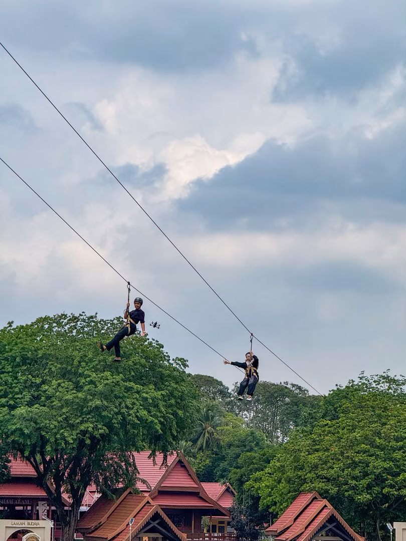 Visitors riding the zipline at Zipline Adventure Shah Alam in Selangor