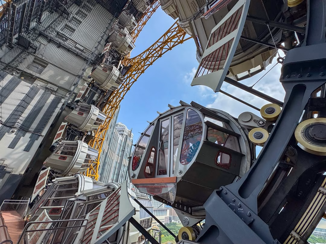 Close-up view of the Golden Reel Ferris wheel cabins and supporting structure at Studio City Macau.